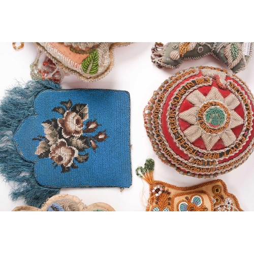 31 - A quantity of 19th-century hand-worked beadwork items to include various British and American 'Sweet... 