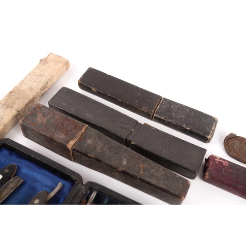 33 - A collection of 19th and early-20th century cutthroat razors. To include a part-complete 'Days of th... 