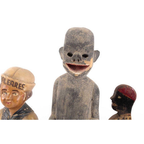 39 - A group of decorative figural toys and sculptures predominantly late-19th early-20th century of vari... 