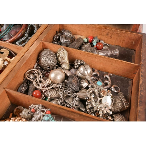 45A - A collection of early-mid 20th-century costume jewellery, including various charms, pendants, bracel... 