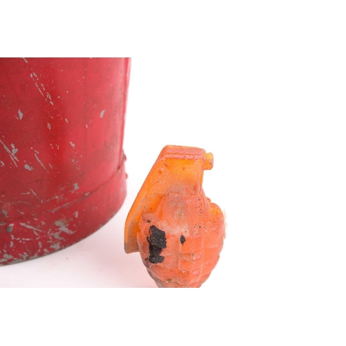 75 - Nancy Fouts (American, 1945-2019), 'Fire Bucket', 1999, vintage bucket, cast resin grenades, flicker... 