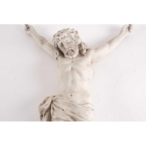 86 - An early 20th century Continental bisque porcelain corpus of the crucified Christ. Bearing indistinc... 