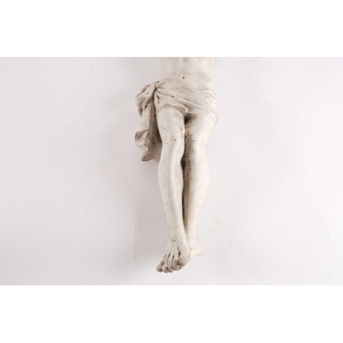 86 - An early 20th century Continental bisque porcelain corpus of the crucified Christ. Bearing indistinc... 