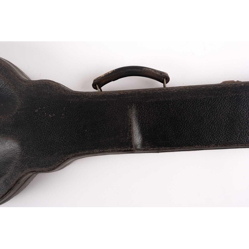 9 - Nancy Fouts (American, 1945-2019) an abstract custom-made leather, plastic, and foam-based luggage c... 