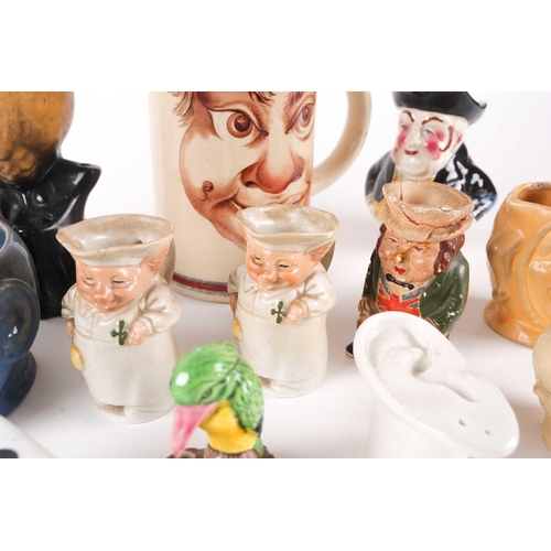 92 - A quantity of early-late 20th-century novelty ceramics to include various small jugs, cruets, etc. m... 