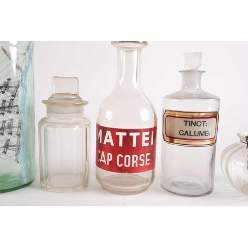 94 - A late 20th-century model ship in a bottle, together with various other glassware to include several... 