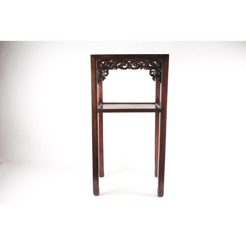 100 - A Chinese hongmu official tea table, 19th century, the rectangular top above a pierced and carved st... 