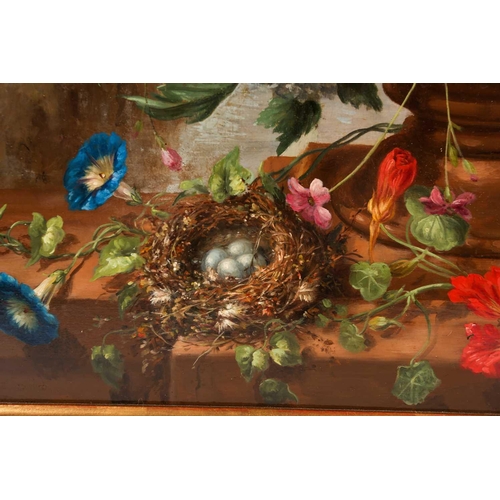 48 - Late 19th or early 20th century school, a large and vibrant still life study of flowers in an urn, a... 