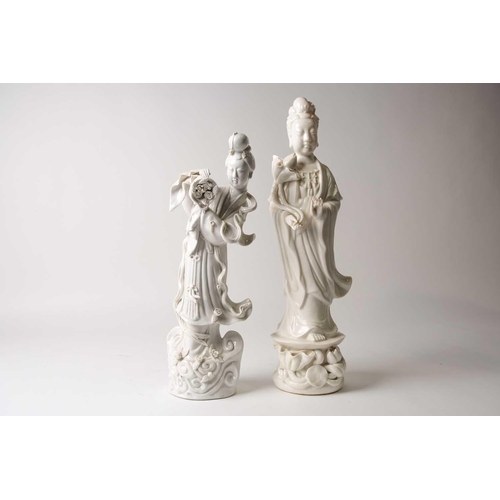 84 - Two Chinese blanc de chine figures, Guanyin & Lan Caihe, 20th century, Guanyin holding a lotus bud, ... 
