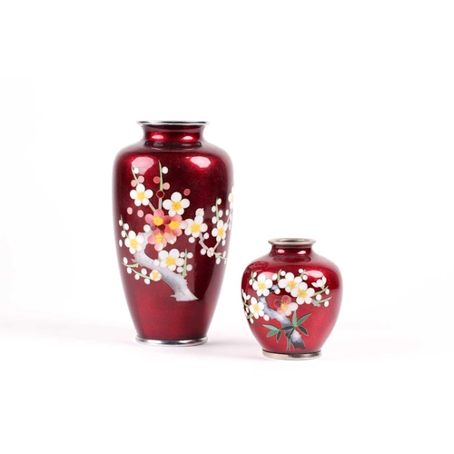 86 - Two Japanese akasuke cloisonne vases, Showa period, each with plum blossom decoration against a pige... 