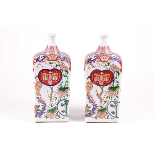 88 - A pair of Arita Imari square vases, circa 1900, based upon gin bottles of the 17th century, the neck... 