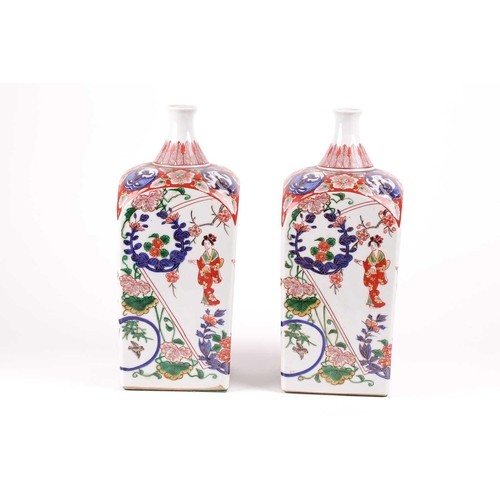 88 - A pair of Arita Imari square vases, circa 1900, based upon gin bottles of the 17th century, the neck... 