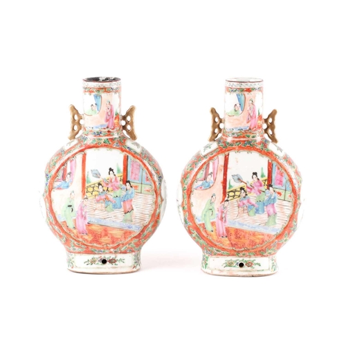 89 - A pair of canton enamel porcelain moon flasks, Bianhu, early 20th century, painted with panels of co... 