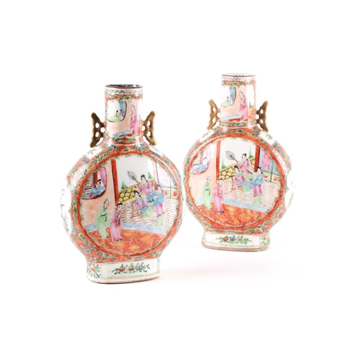 89 - A pair of canton enamel porcelain moon flasks, Bianhu, early 20th century, painted with panels of co... 