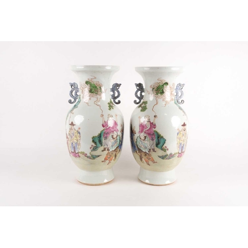 97 - A pair of large Chinese Famille rose porcelain baluster vases with pieced cloud handles. Probably la... 