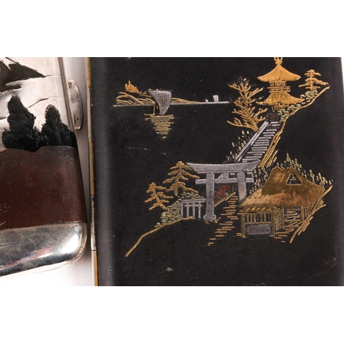 104 - A Japanese sterling silver cigarette case, Taisho/Showa period, the landscape decoration in oxidised... 