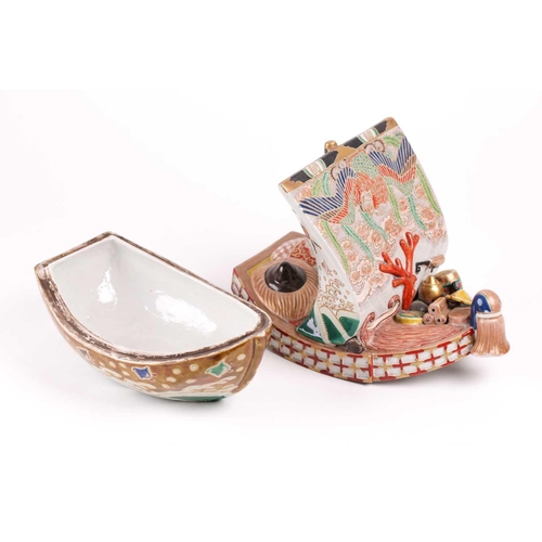 124 - A Japanese Kutani takarabune censer, circa 1910, the sail painted with a phoenix in stippled clouds,... 