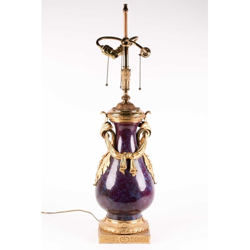 132 - A large Chinese flambe glazed vase with French ormolu mounts, the sang de boeuf glaze with lavender ... 