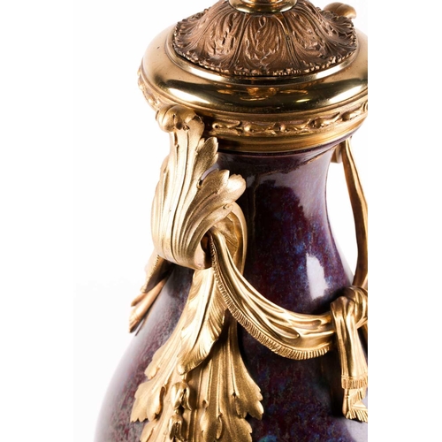 132 - A large Chinese flambe glazed vase with French ormolu mounts, the sang de boeuf glaze with lavender ... 