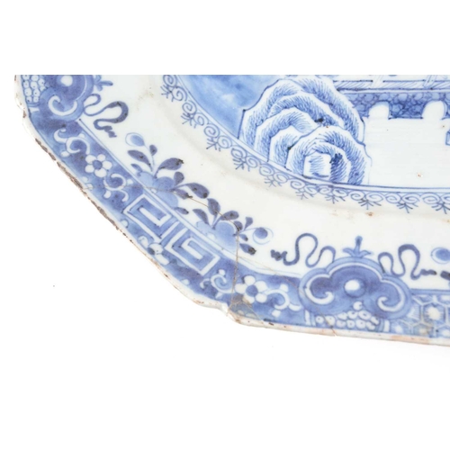 135 - Two Chinese blue & white export porcelain meat platters, late 18th century, each with landscape deco... 