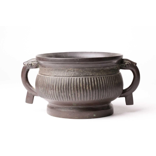 136 - A Chinese bronze censer, late Qing, with everted rim above a band of leiwen in turn above a ribbed b... 