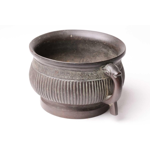 136 - A Chinese bronze censer, late Qing, with everted rim above a band of leiwen in turn above a ribbed b... 