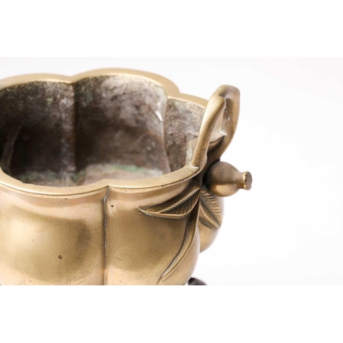 138 - A Chinese brass censer, late Qing, of hexagonal lobed form, with simulated bamboo handles terminatin... 