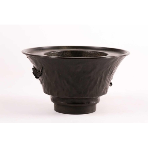 140 - A Japanese bronze censer, Meiji period, of circular tapering form, with applied dragon amongst whisp... 