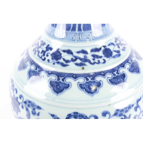 163 - A Chinese porcelain blue & white lotus vase, late Qing, the neck painted with waves above ruyi heads... 