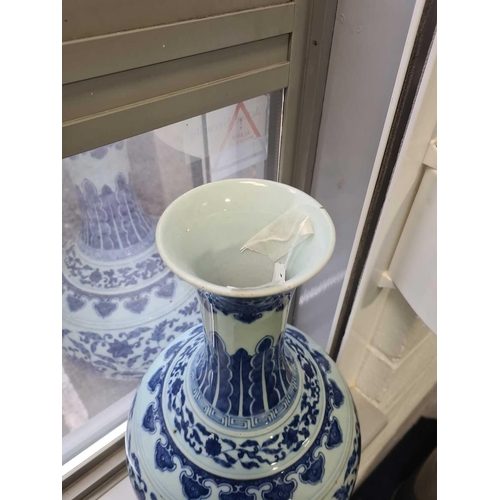 163 - A Chinese porcelain blue & white lotus vase, late Qing, the neck painted with waves above ruyi heads... 
