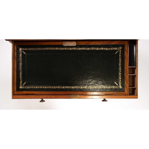169 - A Regency ebonised and figured satinwood chiffonier with a fitted secretaire frieze drawer, with sup... 