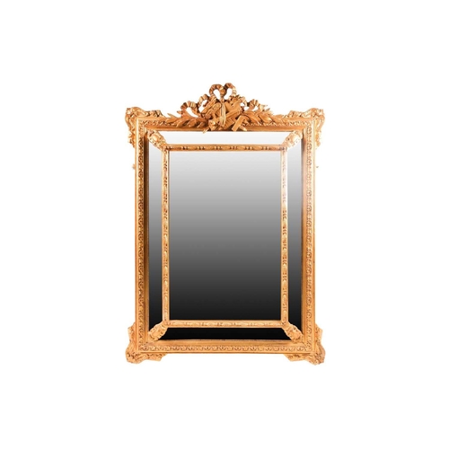 172 - A 19th-century Venetian style carved wood and gilt gesso, rectangular cushion frame wall mirror. Wit... 