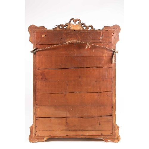 172 - A 19th-century Venetian style carved wood and gilt gesso, rectangular cushion frame wall mirror. Wit... 