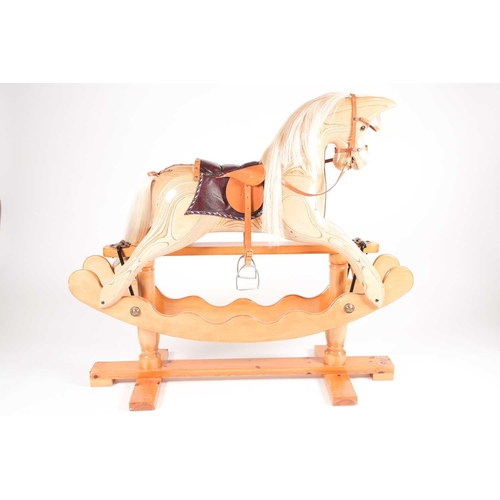 173 - A laminated pine rocking horse, by Ian Armstrong, Rocking Horse Maker of Durham City, England, on pi... 