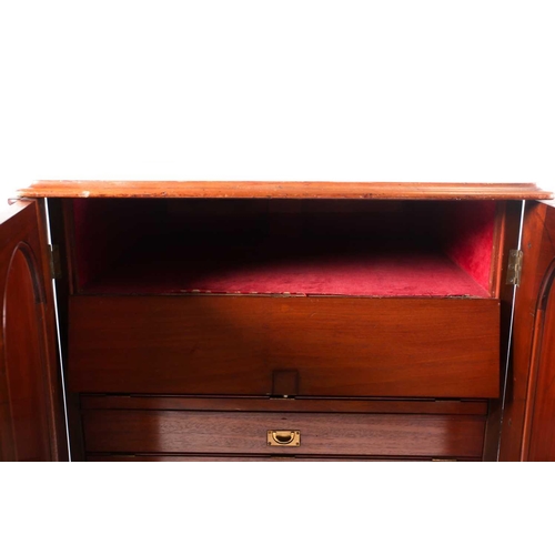 174 - A Victorian figured walnut freestanding collectors/ folio cabinet, with a pair of arched panel doors... 