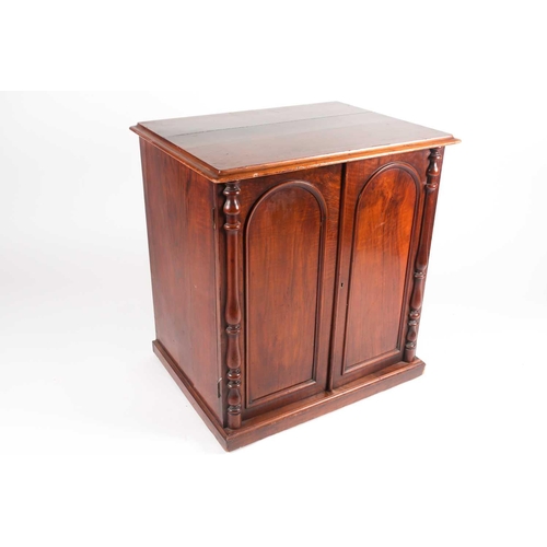 174 - A Victorian figured walnut freestanding collectors/ folio cabinet, with a pair of arched panel doors... 