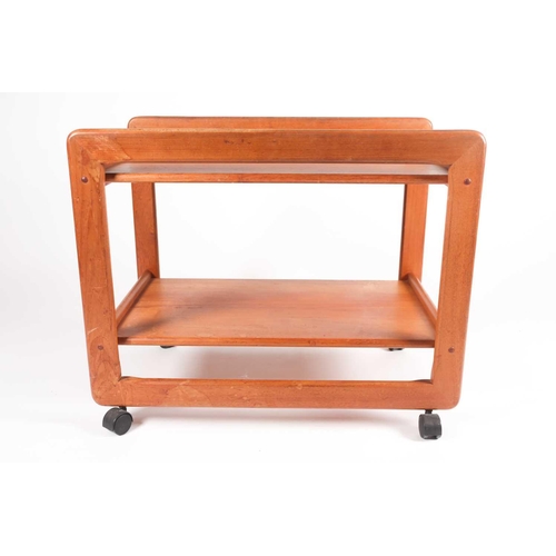 192 - A Danish teak trolley by Tarm Stole OG Mobelfabrik, mid 20th century, on black plastic castors, remn... 