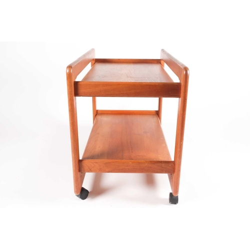 192 - A Danish teak trolley by Tarm Stole OG Mobelfabrik, mid 20th century, on black plastic castors, remn... 