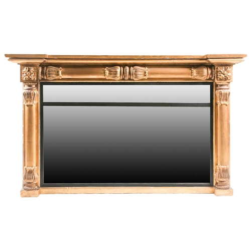 197A - A William IV inverted breakfront carved wood and gilt gesso rectangular overmantle mirror. With appl... 