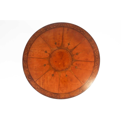 200 - A George III style marquetry inlaid satinwood circular centre table, C1900. The segmented top inlaid... 