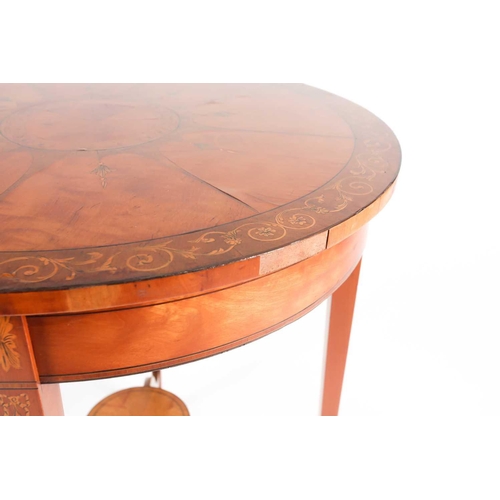 200 - A George III style marquetry inlaid satinwood circular centre table, C1900. The segmented top inlaid... 