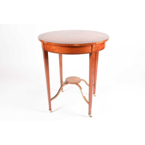 200 - A George III style marquetry inlaid satinwood circular centre table, C1900. The segmented top inlaid... 