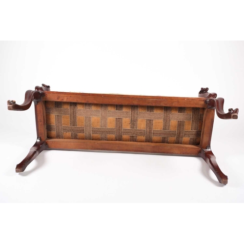 205 - A mid-Victorian carved mahogany duet stool, with scroll ends and stuff over upholstery, supported by... 