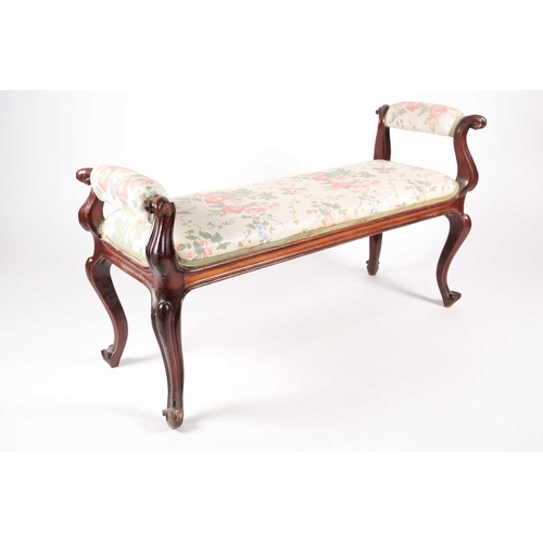 205 - A mid-Victorian carved mahogany duet stool, with scroll ends and stuff over upholstery, supported by... 