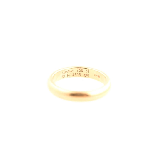 Cartier. An 18ct yellow gold wedding band ring engraved Carter