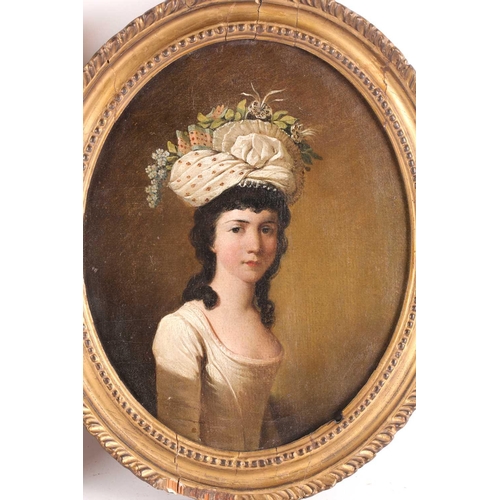 15 - An 18th century English school waist-length oval portrait of a lady with a floral headdress, oil on ... 