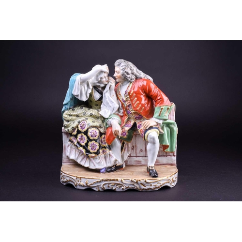 230 - A large Samson of Paris porcelain figure group, bearing a Derby mark, a gentleman and lady seated on... 