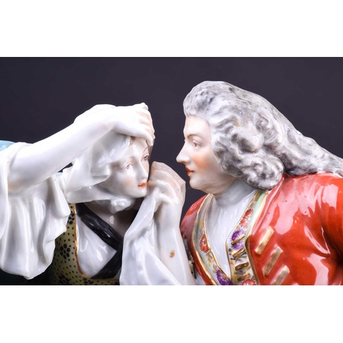 230 - A large Samson of Paris porcelain figure group, bearing a Derby mark, a gentleman and lady seated on... 