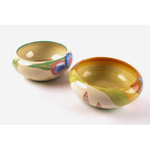 234 - Two Clarice Cliff pottery bowls, 'Windbells' and 'Autumn' pattern variation, inverted rims. Printed ... 