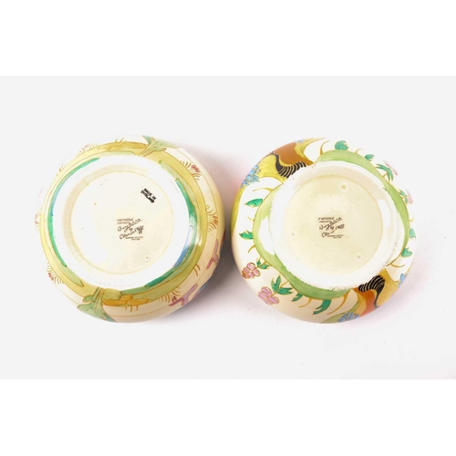 234 - Two Clarice Cliff pottery bowls, 'Windbells' and 'Autumn' pattern variation, inverted rims. Printed ... 